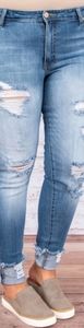 A pair of brand new distressed Jean's by Chic Soul